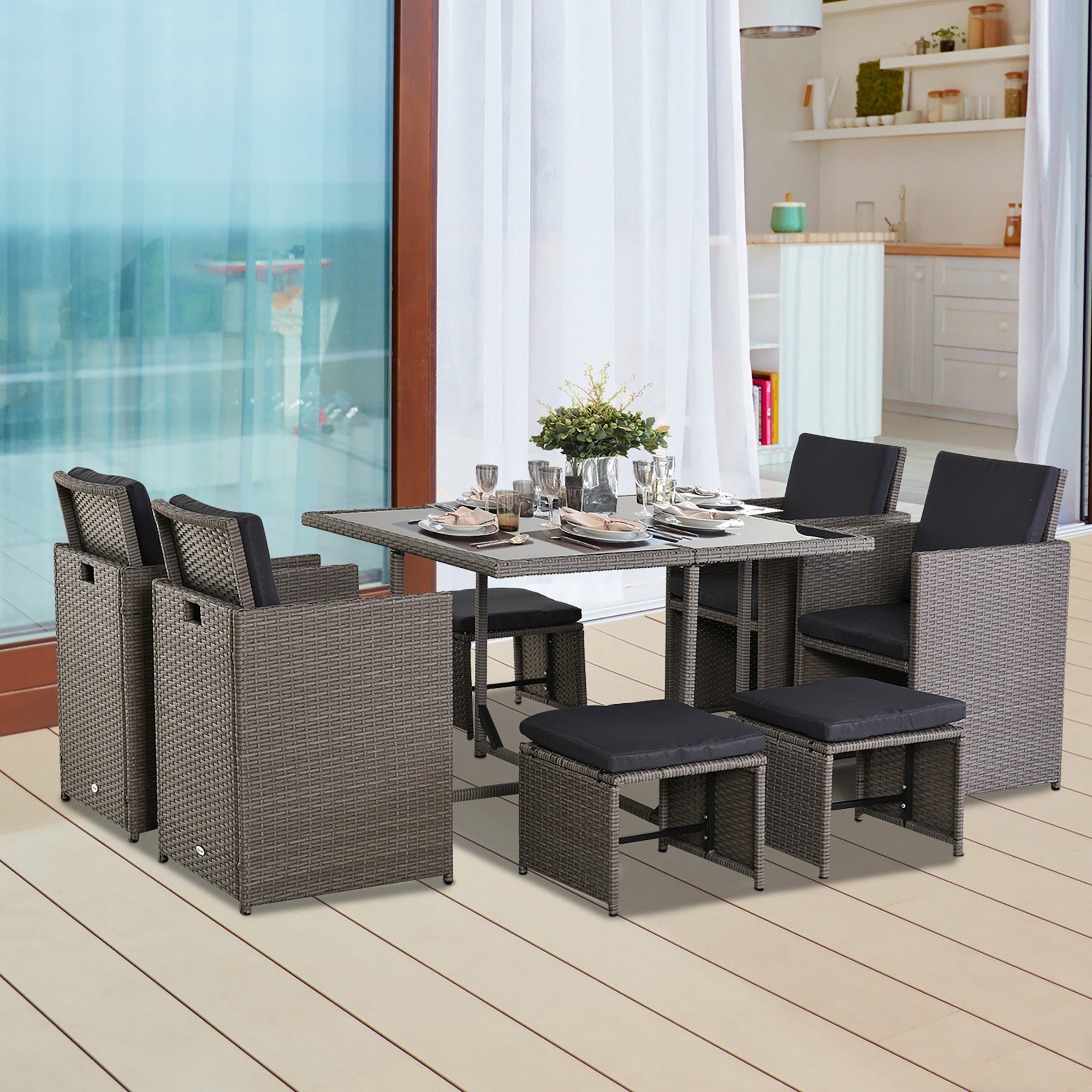 Set Tavolo e 4 Sedie da giardino in Rattan Sintetico e Acciaio con 4 Poggiapiedi Grigio