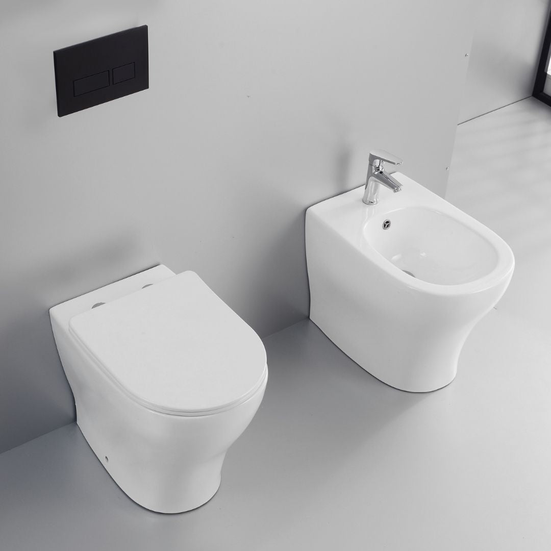 Coppia sanitari fun a pavimento vaso e bidet sedile frizionato