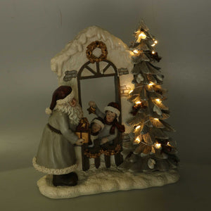 Statua resina babbo natale e bambini grigio con led cm 22x9,5xh22,5