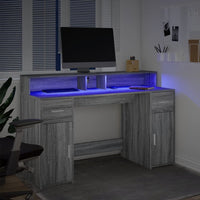 Scrivania con Luci LED Grigio Sonoma 140x55x91cm in Multistrato 3309425