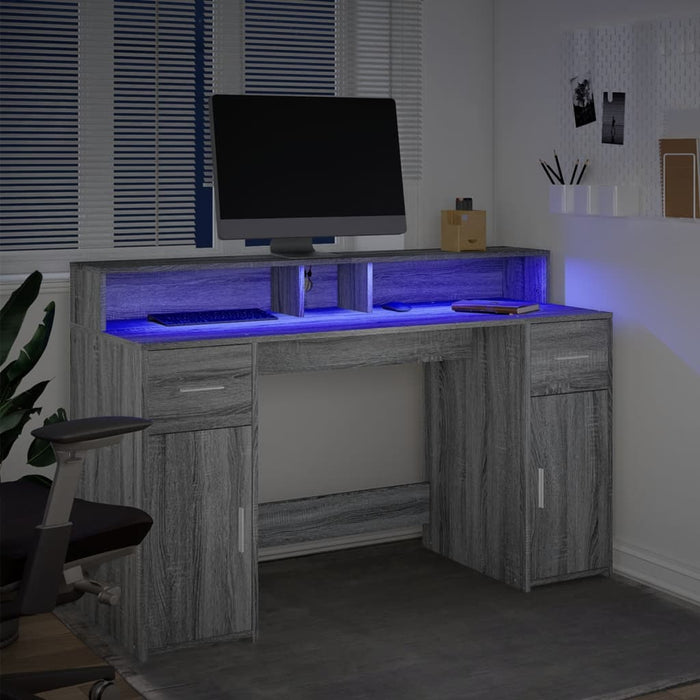 Scrivania con Luci LED Grigio Sonoma 140x55x91cm in Multistrato 3309425