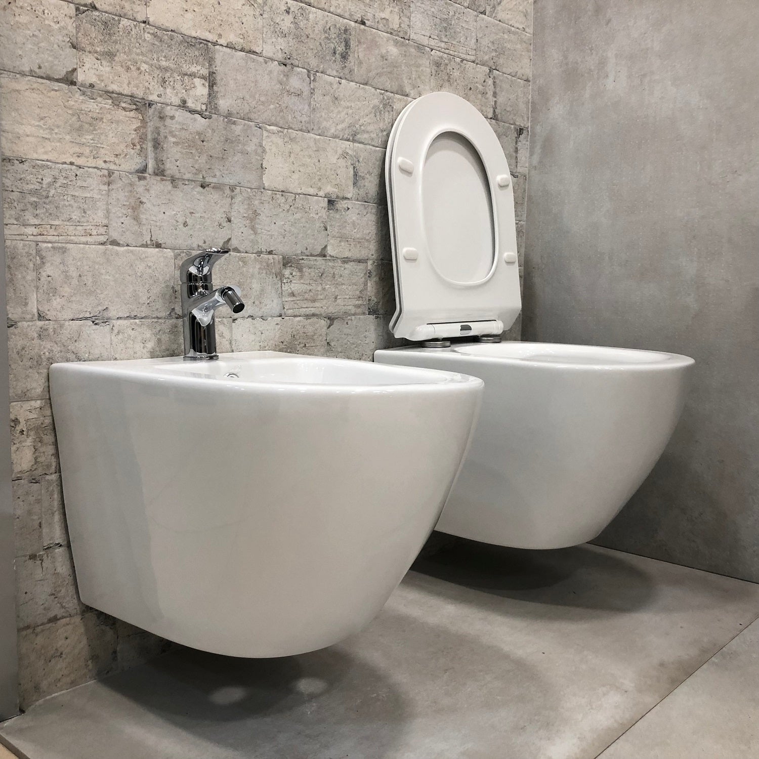 Coppia di sanitari wc e bidet sospesi ceramica SICENA ROUNDED