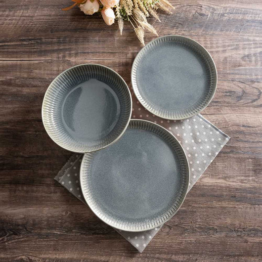 Set di 18 piatti in ceramica Erika rifiniti a mano grigio