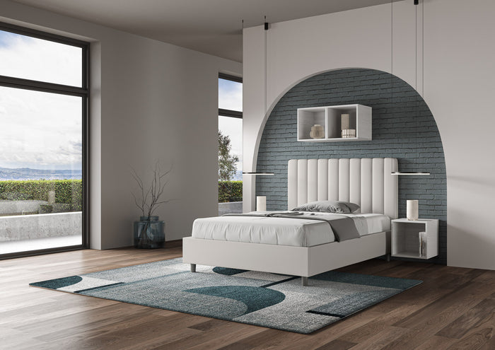 Letto una piazza e mezza contenitore imbottito 120x190 similpelle bianco Agueda