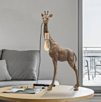 Lampada da tavolo con giraffa oro antico 40x22x80cm