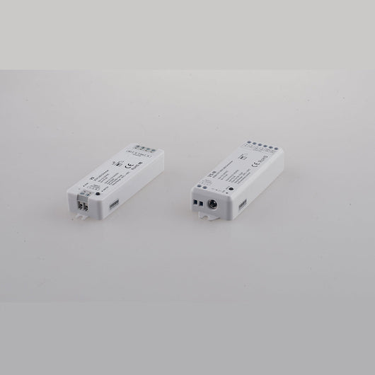 Ricevitore RF 2.4G input: 15.5A 12-24V output: 5ch;3a/ch - 5x(36-72)W 11,4x3,8x2 cm.