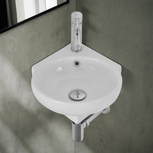 Lavabo sospeso ad angolo 39x36 in ceramica lucida con design ovale