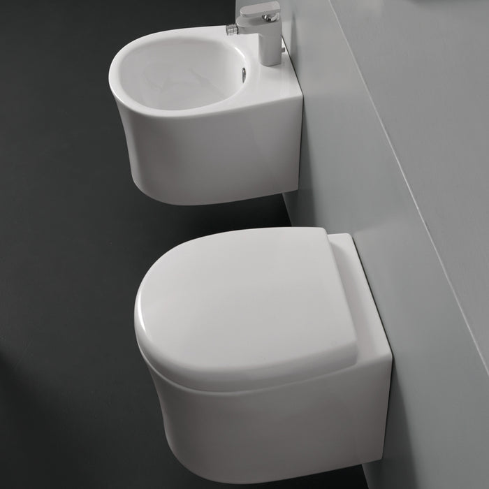 Sanitari in ceramica sospesi vaso wc + bidet + sedile made in italy con/senza staffe *** accessori con sedile frizion...