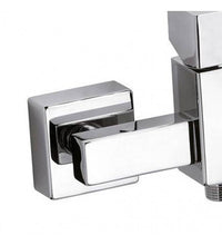 Rubinetto serie cube waterfall bordo vasca dotato di deviatore, bocca cascata e doccetta cod 77808