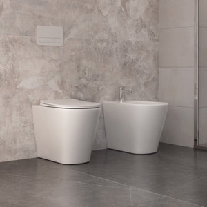 Sanitari a terra filo muro senza brida in ceramica bianca ocean