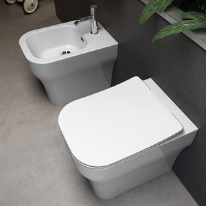 Wc filo muro rimless con scarico traslato Olympia serie Synthesis bianco lucido