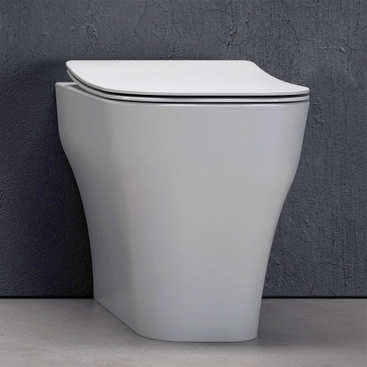 Wc filo muro rimless con scarico traslato Olympia serie Synthesis bianco lucido