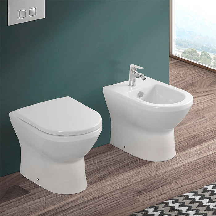 Wc filomuro Rimless in ceramica lucida scarico universale Round 